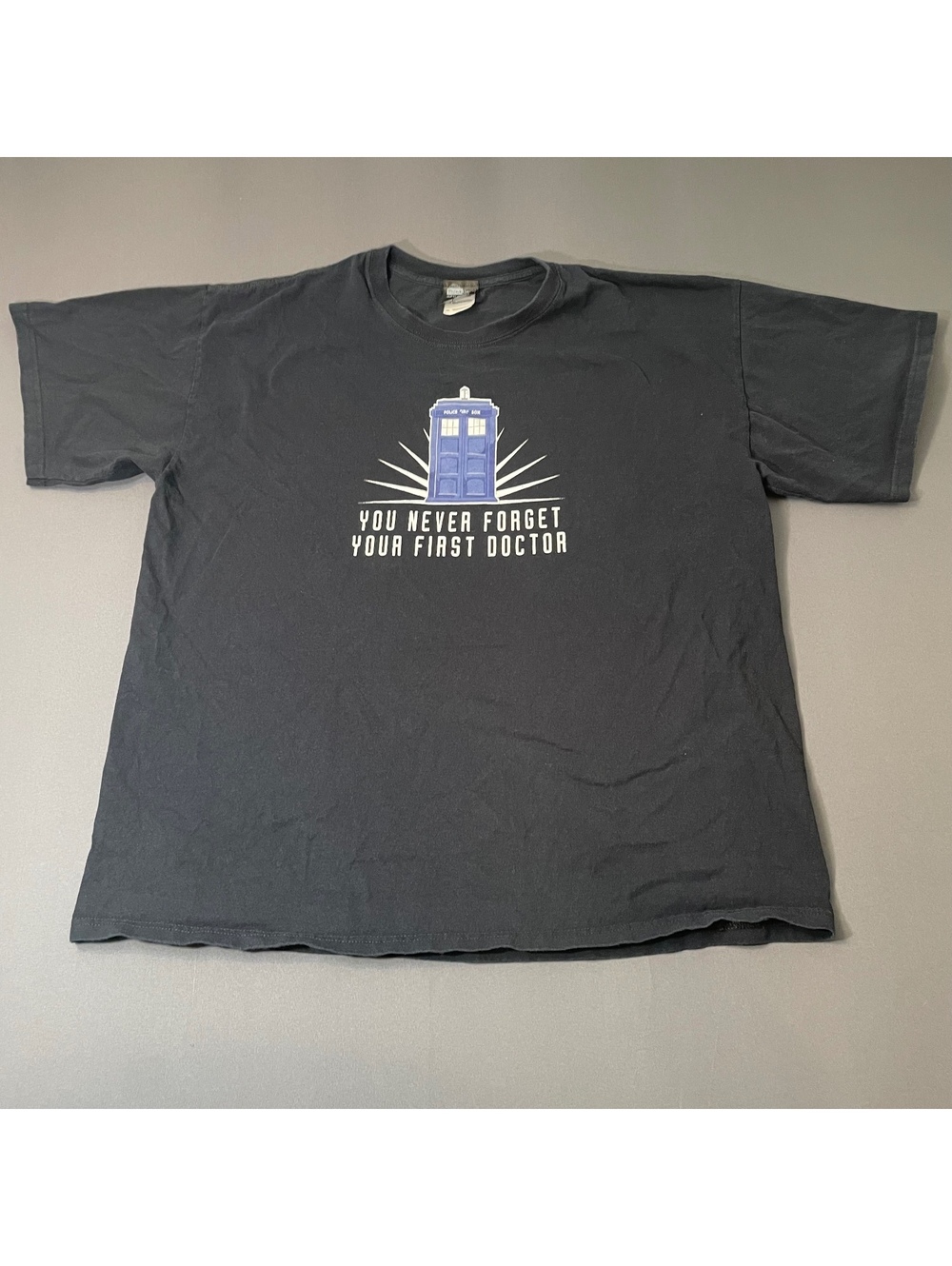 ThinkGeek Black Graphic T-Shirt You Never Forget Your First Doctor Who XL Cotton